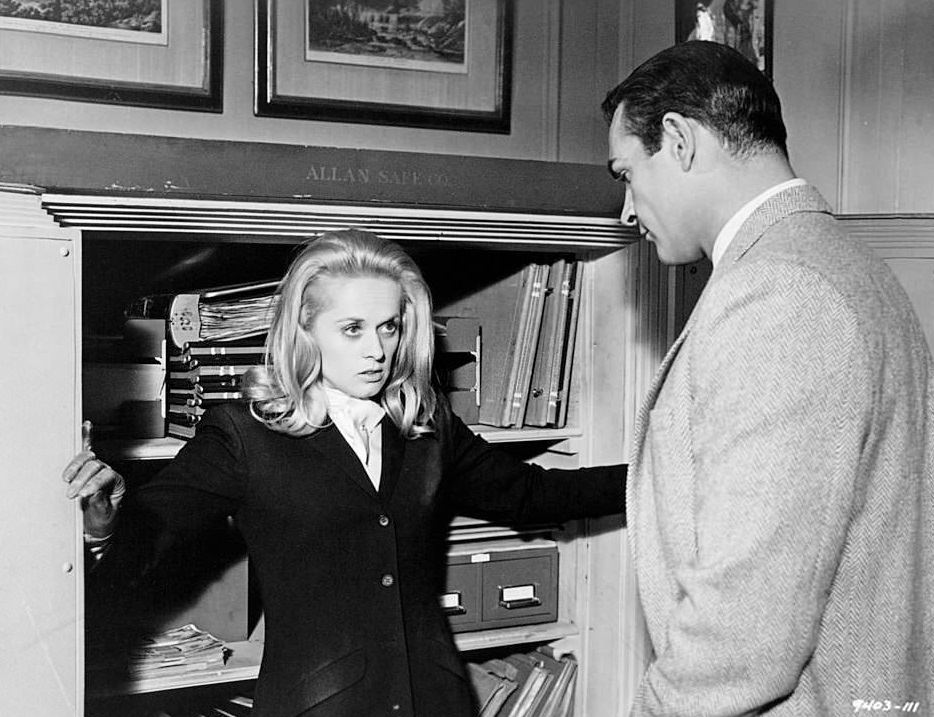 Tippi Hedren is caught by Sean Connery while trying to rifle his safe in a scene from the film ‘Marnie’, 1964.
