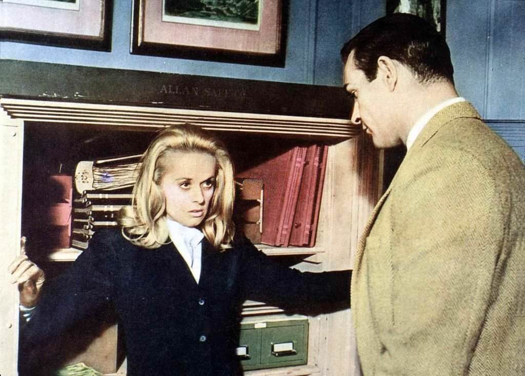Sean Connery catches his wife Marnie (Tippi Hedren) cleaning out his safe in movie ‘Marnie’, 1964.
