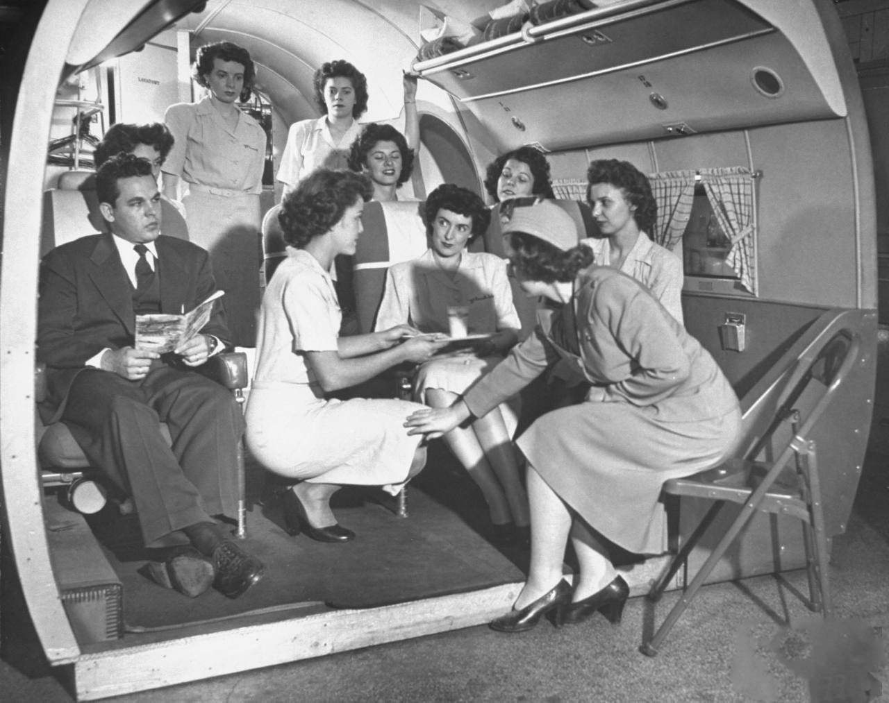 #5 Students at the McConnell Air Hostess School learning the right and wrong ways to serve passengers.