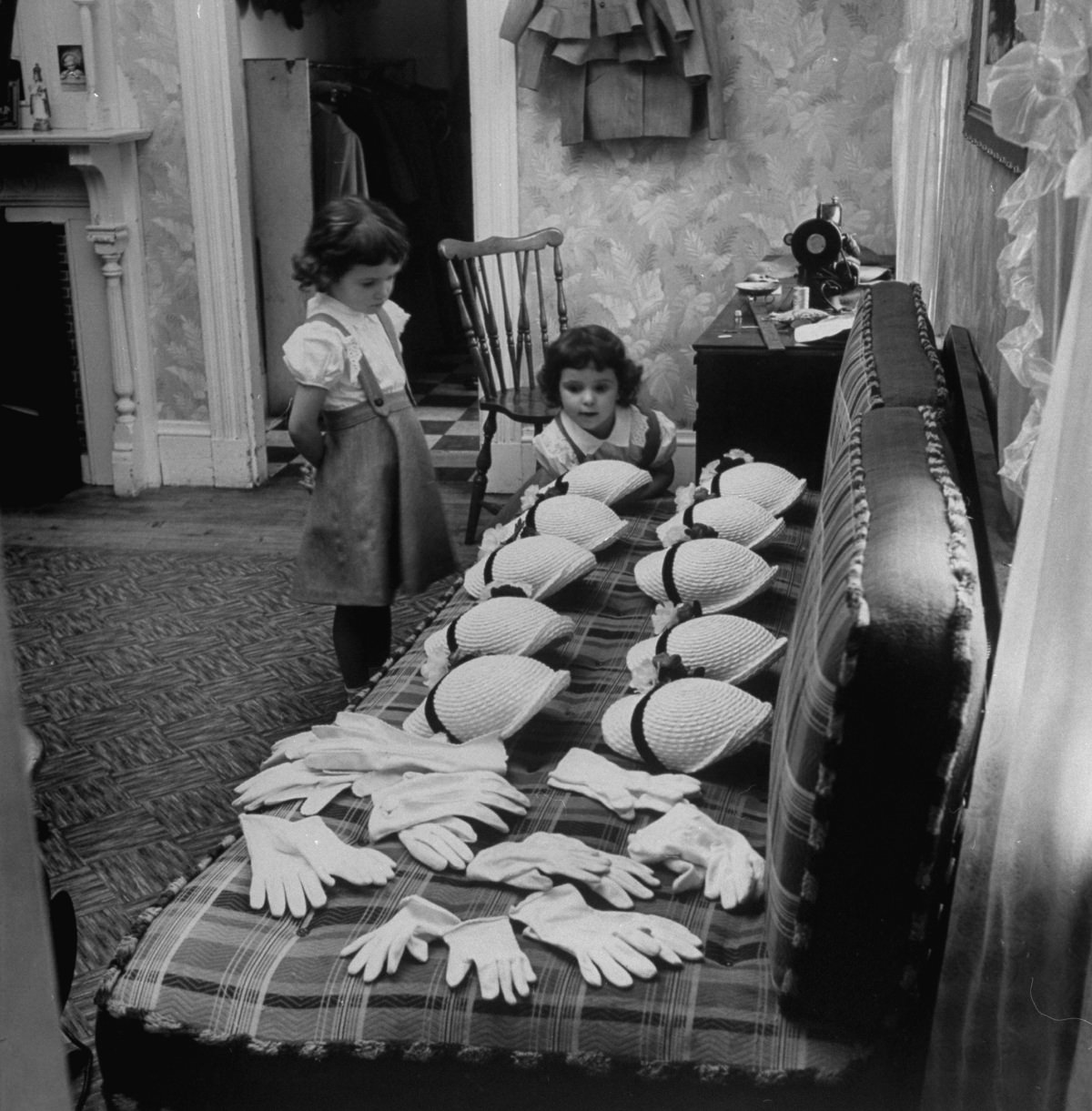 #2 The O’Neil girls’ hats and gloves were inspected by the youngest sisters in preparation for Easter, 1952.