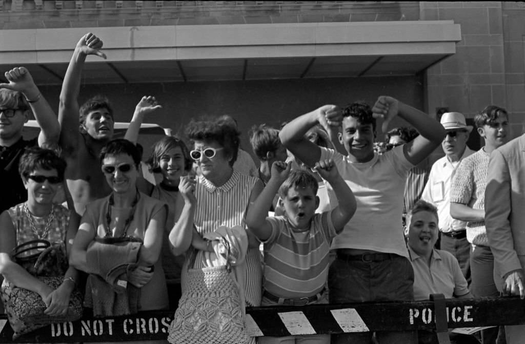 #3 Counter-demonstrators behind a police fence on the Atlantic City Boardwalk, during a Miss America beauty pageant protest, Atlantic City, 1968.