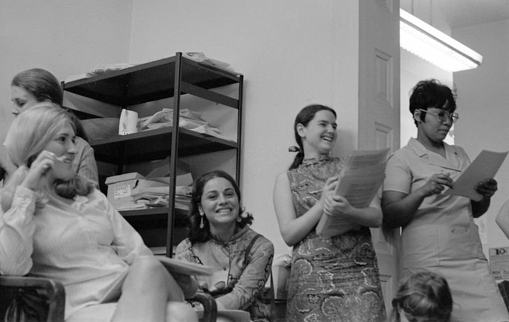 #42 At the Southern Conference Educational Fund (SCEF) office, members of the New York Radical Women group attend a meeting to plan a protest at the Miss America beauty pageant, New York, 1968.