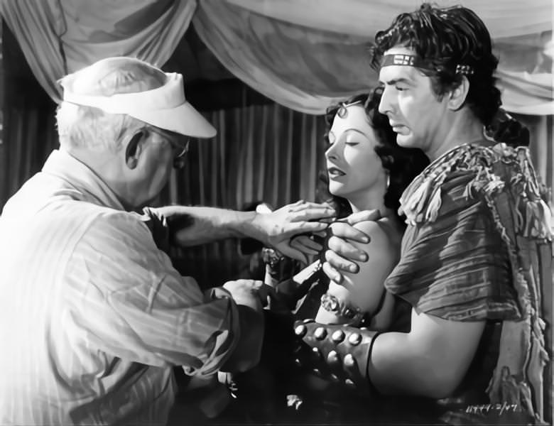 Cecil B DeMille on set candid directing Hedy Lamarr and Victor Mature in ‘Samson and Delilah’, 1949