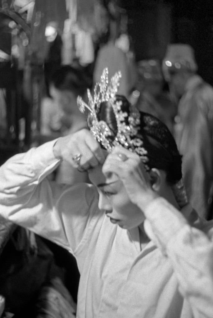#99 Asian girl wearing a little crown in Singapore, 1962