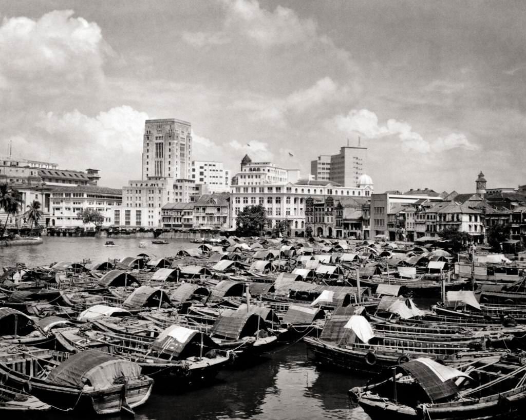 #117 City Buildings Skyline Seen Across Bumboat Cargo Barges Moored in Harbor Singapore, 1960