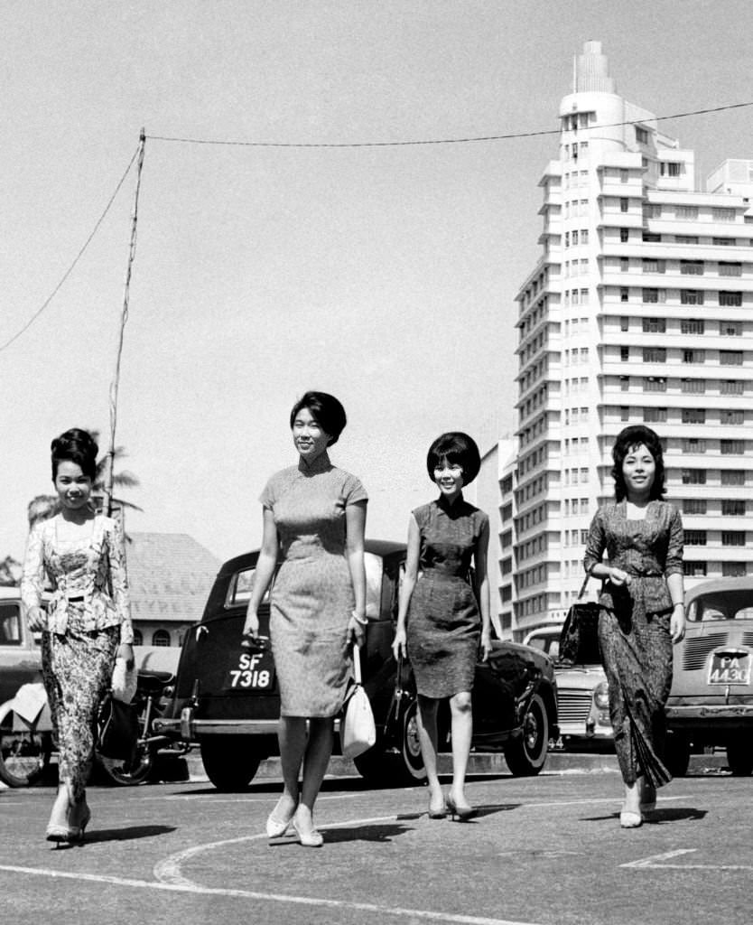 #124 Elegant women in a central street, Singapore, 1968.