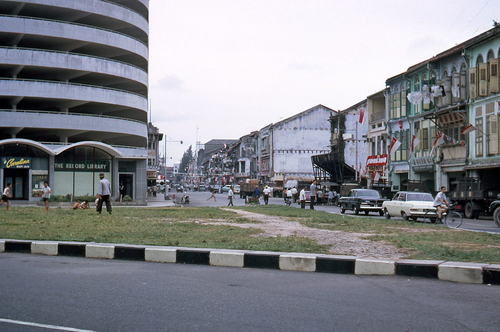 #145 A street corner in Singapore in 1966.