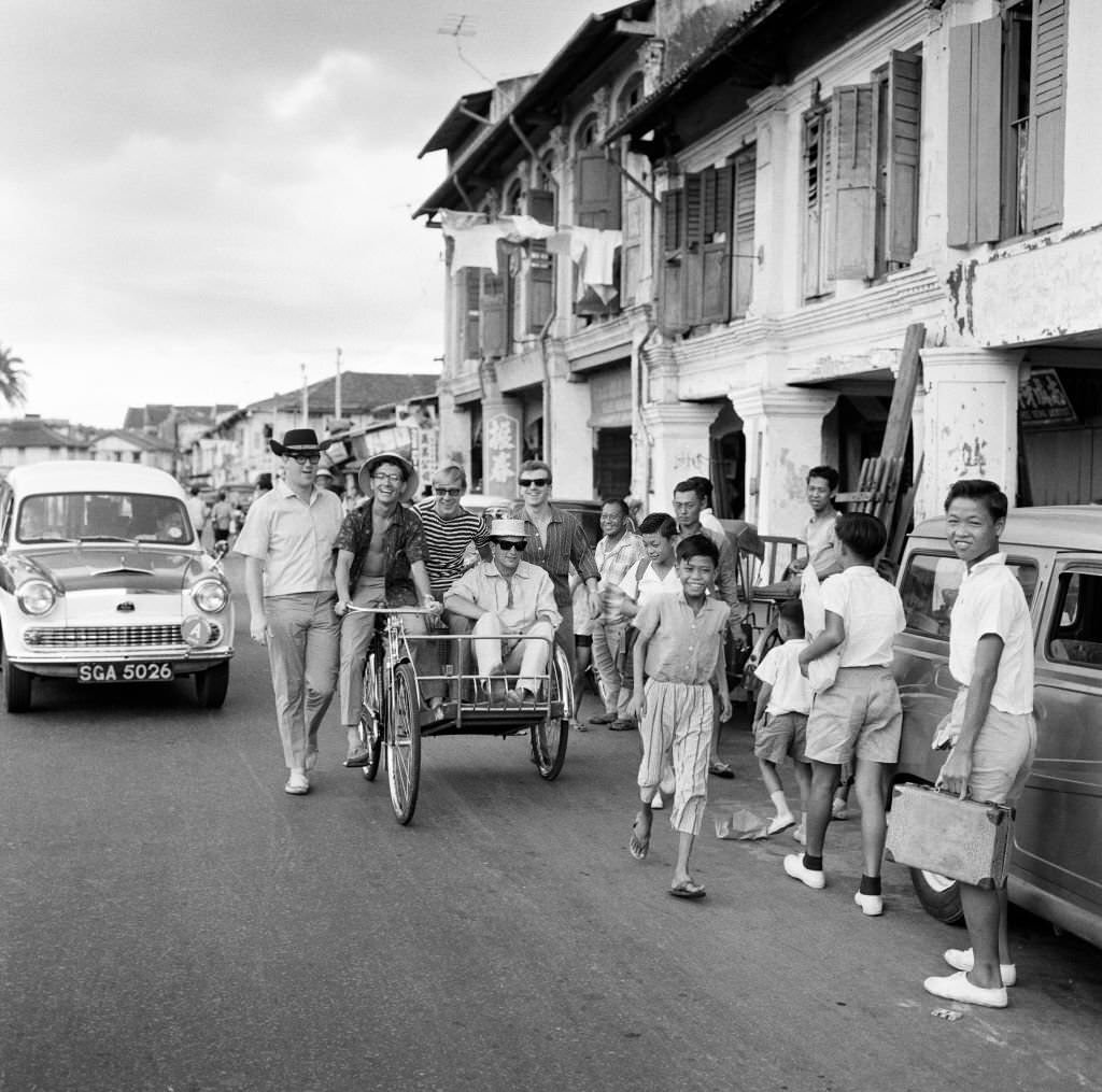 #16 Manchester pop group Freddie and the Dreamers in Singapore during their world tour, 1965