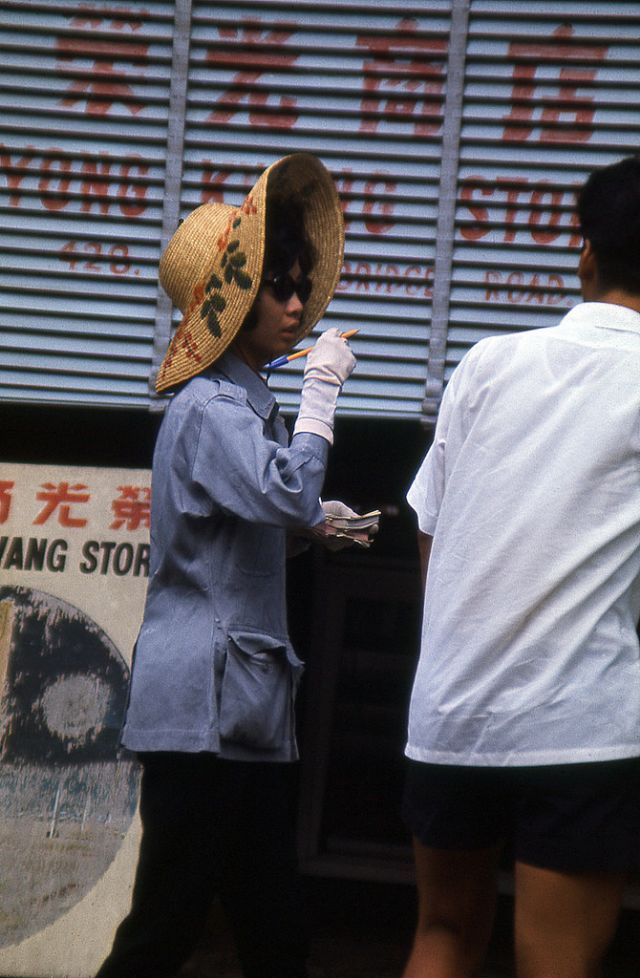 #193 A traffic warden in Singapore, 1960s
