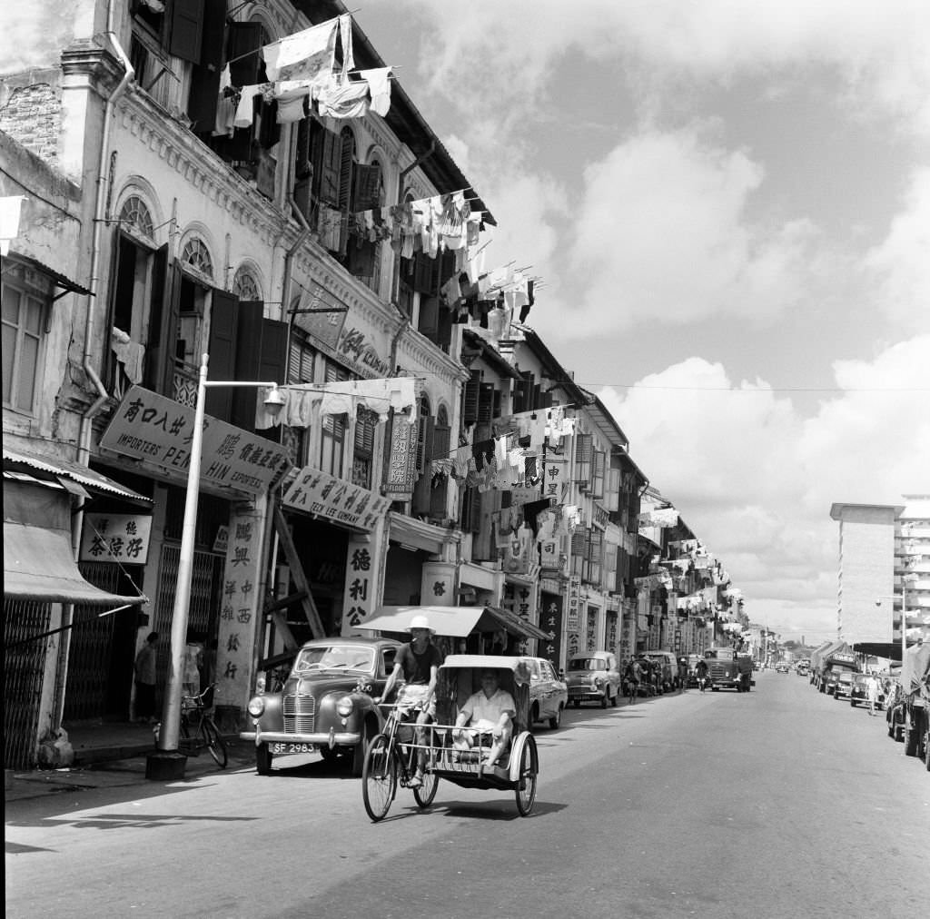 #35 Scenes in Chinatown, Singapore, Upper Hokien Street, where old meets new, 1962