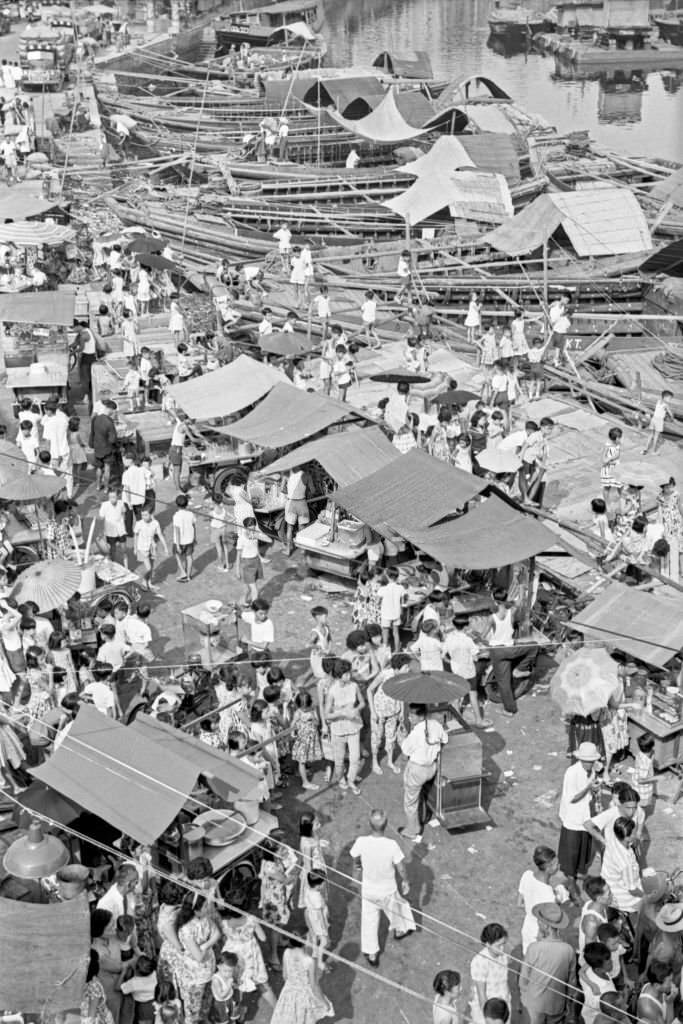 #50 People crowding an outdoor market, Singapore, 1962