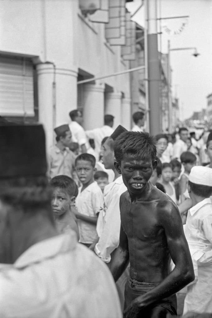#75 Boy in the streets of Singapore, 1962