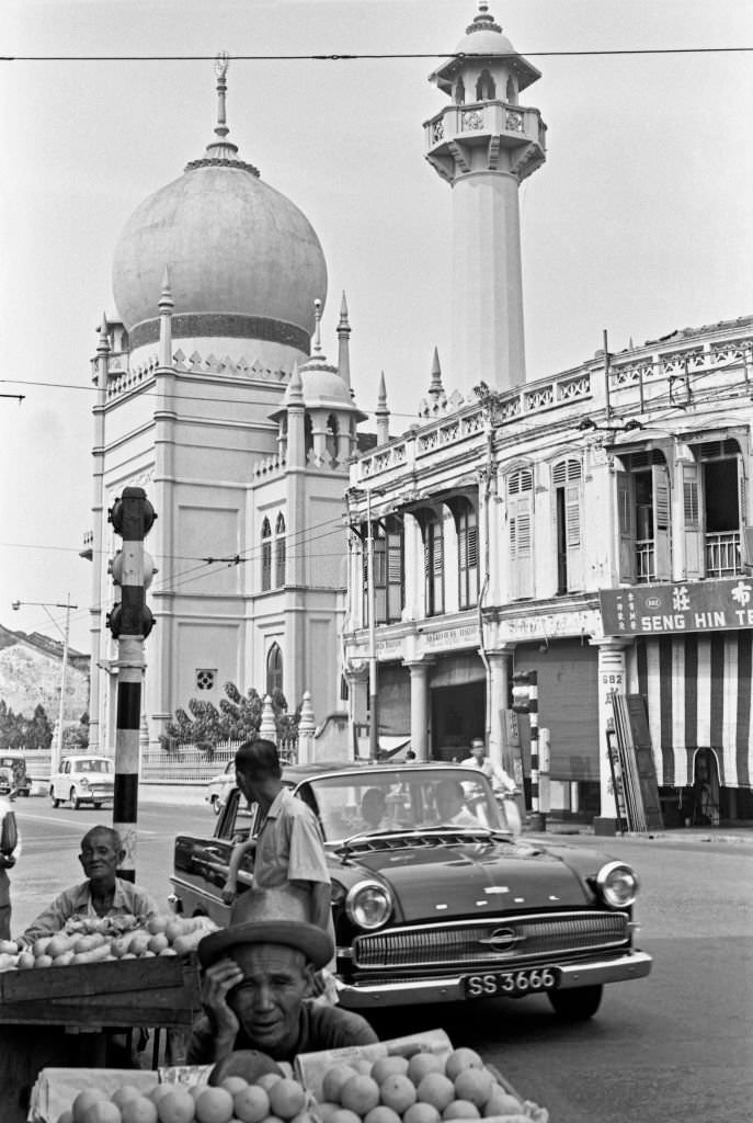 #78 Street vendors outside the Sultan Mosque in Singapore, 1962