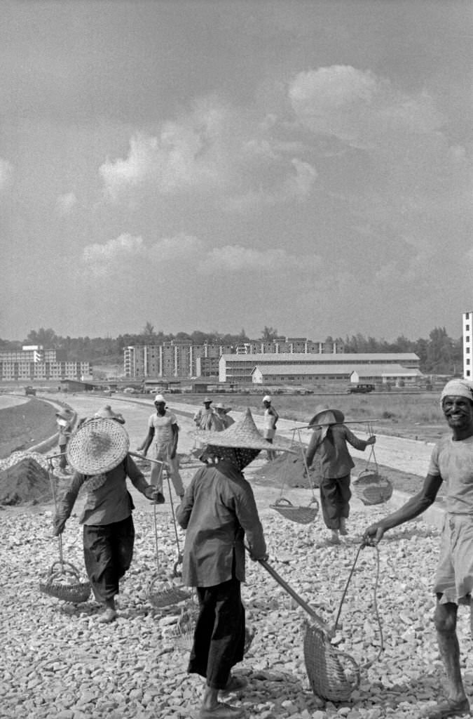 #80 Men and women building a street, Singapore, 1962
