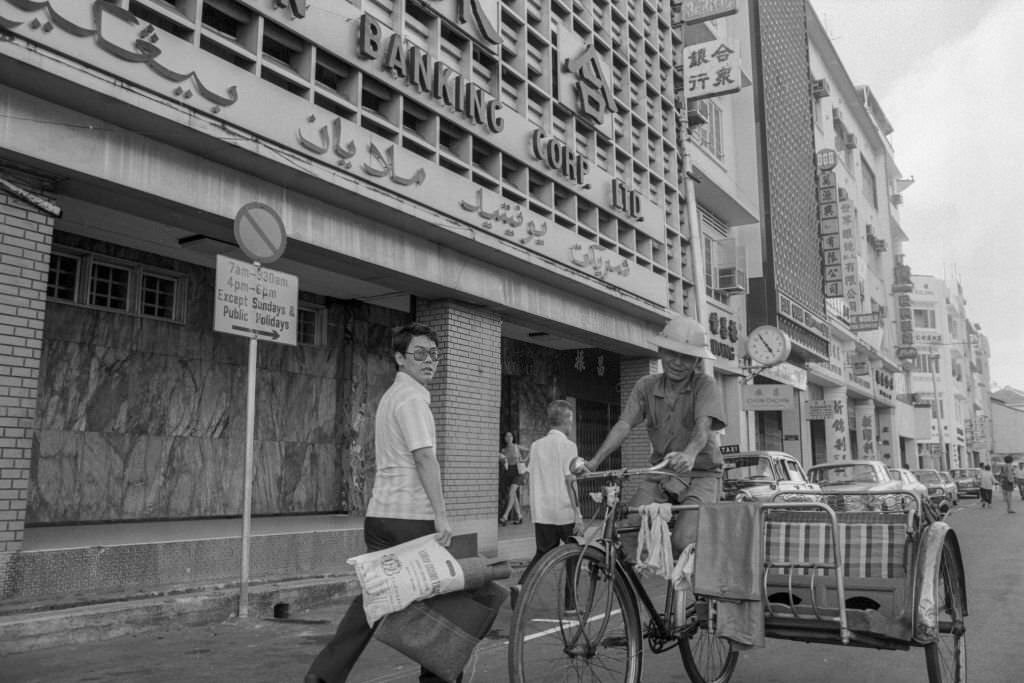 #10 Cycle taxi on a street in Singapore, July 1974.