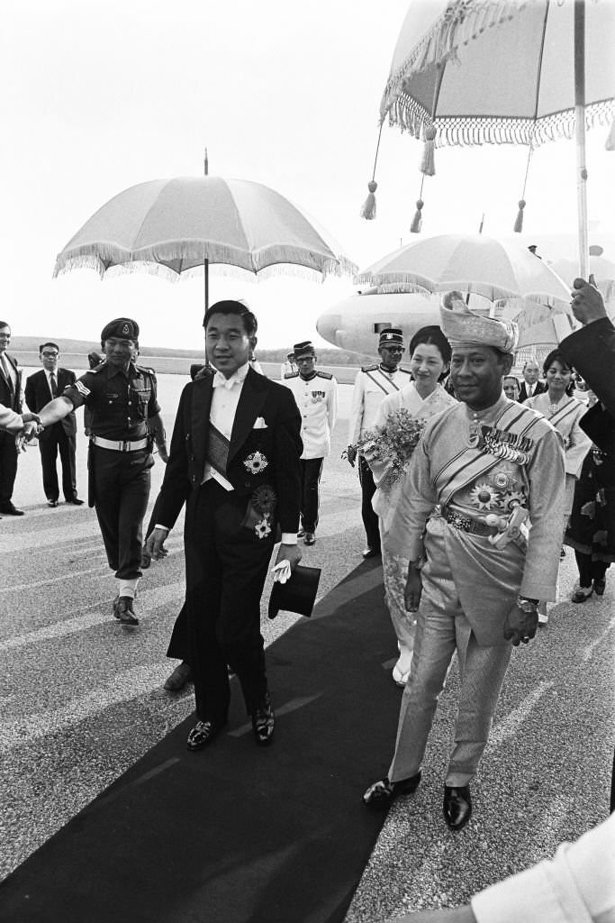 #28 Crown Prince Akihito and Crown Princess Michiko are welcomed by Deputy Yang di-Pertuan Agong Abdul Halim Mu’adzam and his wife Sultanah Bahiyah on arrival at Subang International Airport, 1970