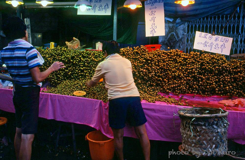 #92 Lychee vendor, 1984