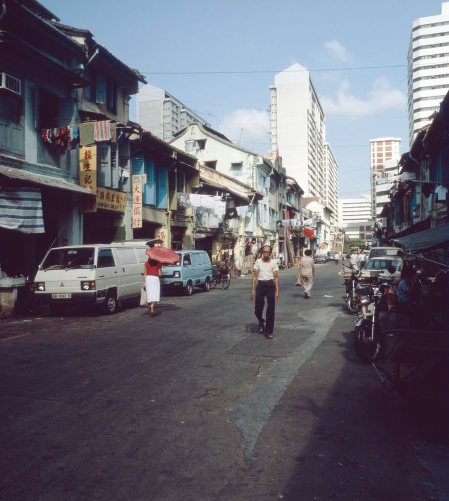 #22 On the way in the streets of Chinatown in Singapore, 1980s.