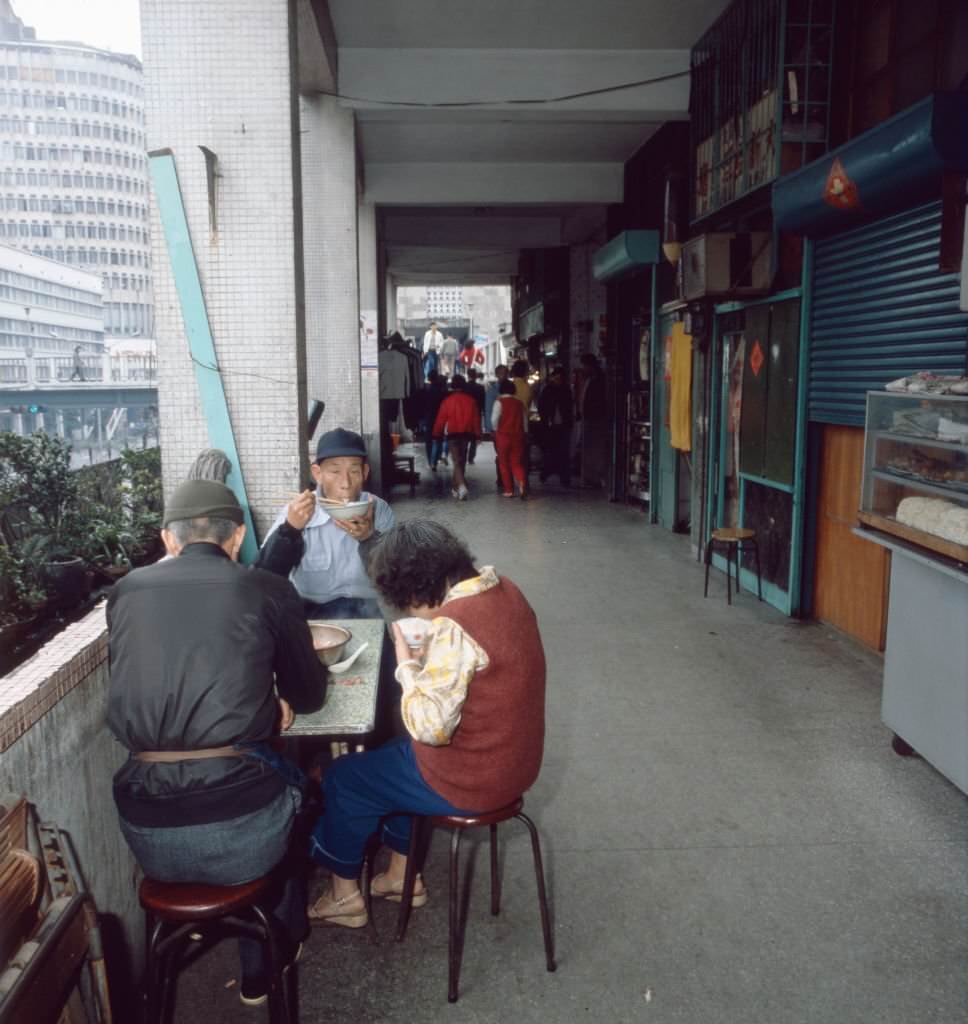 #103 Having lunch in a cookshop of Singapore, 1980s.