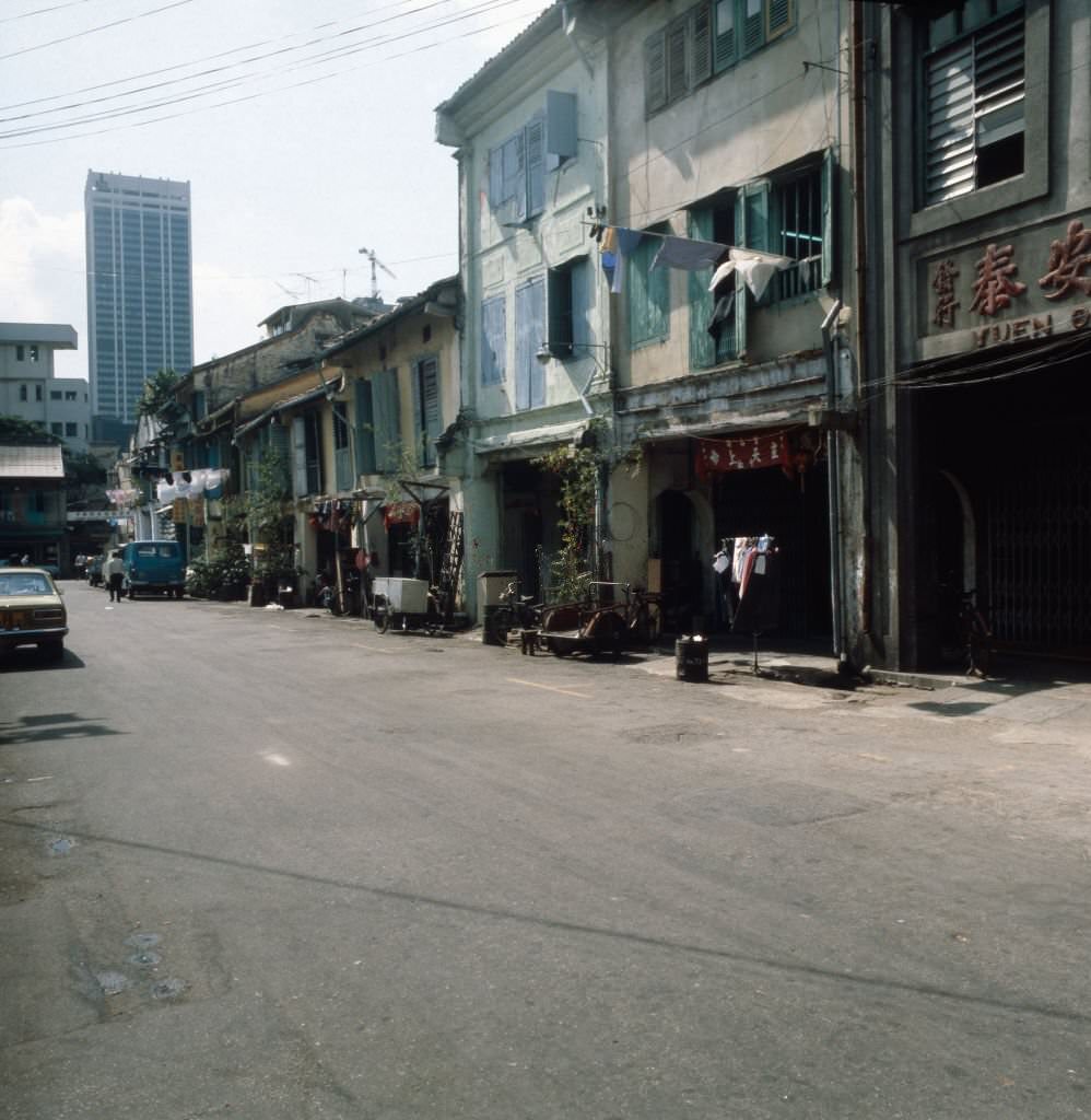 #23 On the way in the streets of Chinatown in Singapore, 1980s.
