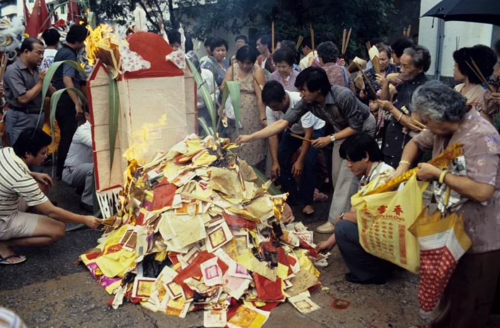 #28 Devotees burning offerings to the Monkey God during his Festival in Chinatown, Singapore, 1985