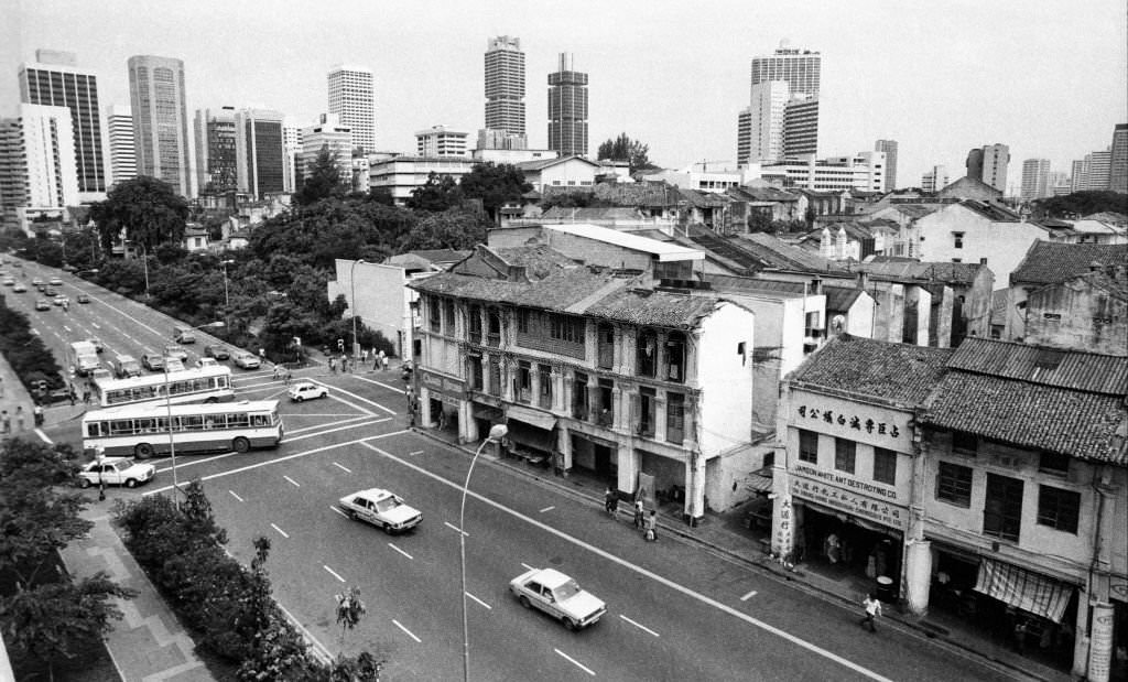 #51 Shophouses on Upper Cross St seen before their residents are relocated in September 1983.