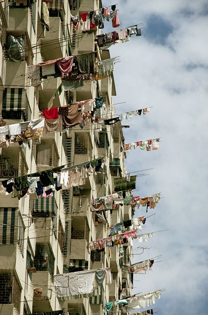 #72 Laundry hangs out to dry on apartment balconies in Singapore, 1980s