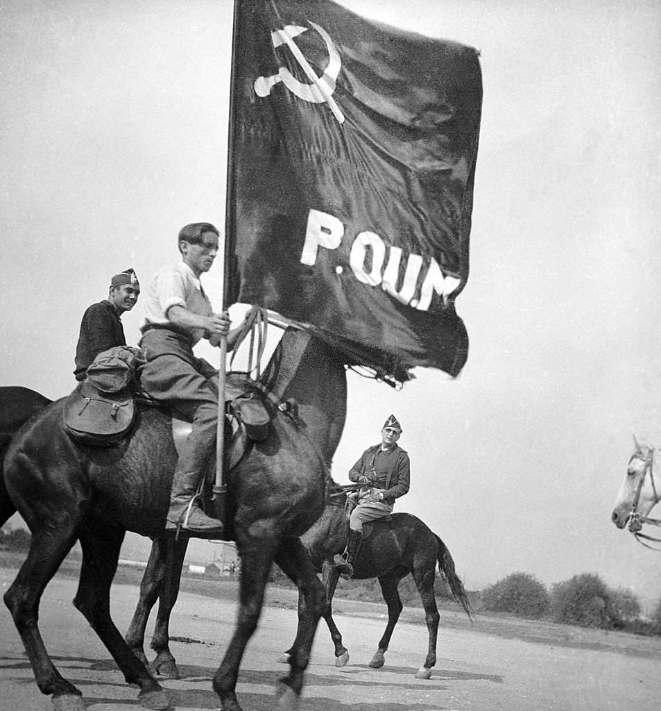 #145 Republican militiamen on horseback (from the Marxist Worker’s party, a Trotskyist faction) operating on the Catalan front in 1936.