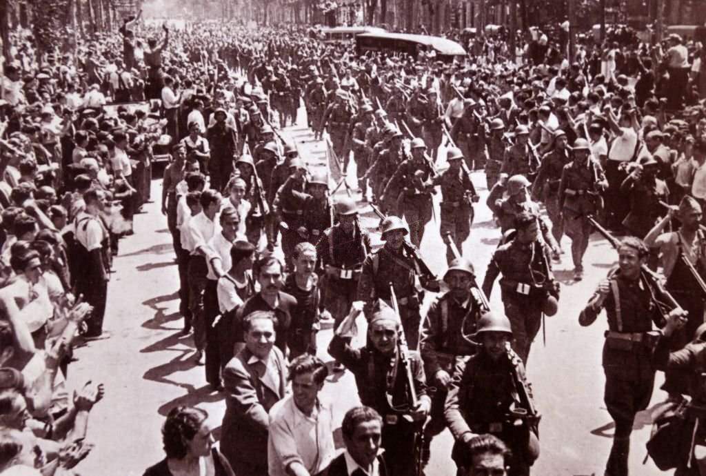 #15 Anti-fascist troops parade through Barcelona, during the Spanish civil war 1936.