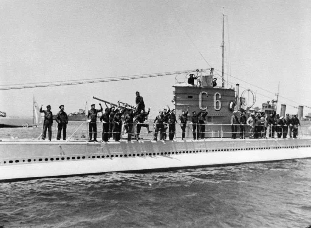#150 Members of the Navy who remained loyal to the Republic are seen standing on a C6 submarine a few days after the coups in 1936.
