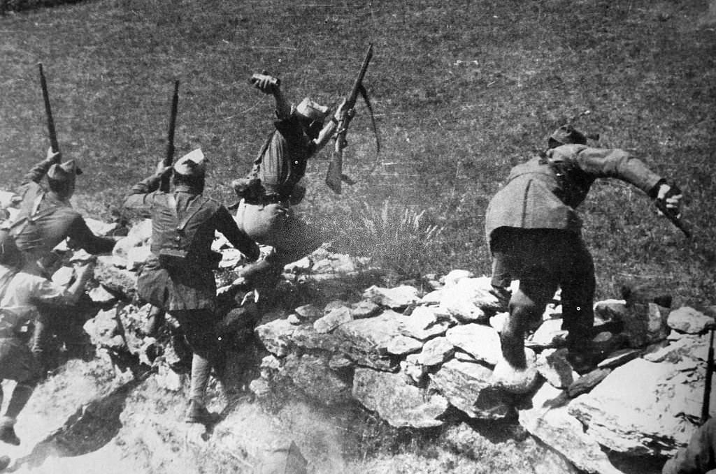 #154 Nationalist soldiers in action during an assault on Madrid, during the Spanish Civil War.