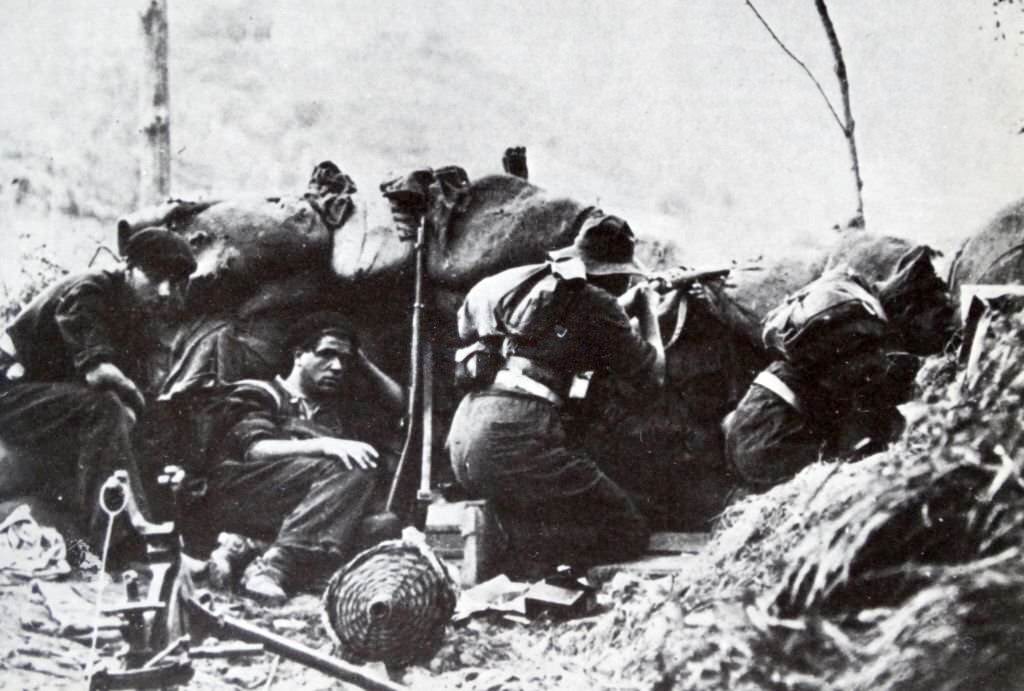 #21 Republican soldiers shelter in a trench during the Campaign of Gipuzkoa, the Spanish Civil War, Nationalist Army conquered the northern province of Gipuzkoa, held by the Republic.