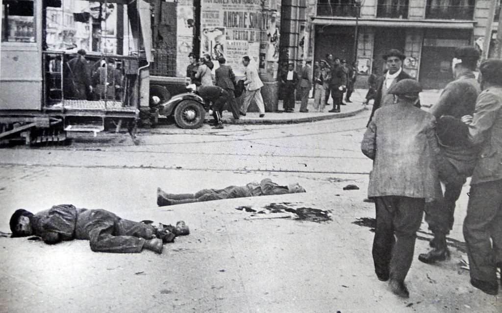 #35 Victims of street fighting in Madrid during the Spanish Civil War.
