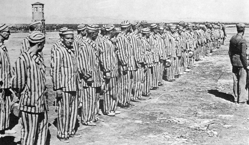 #46 Prisoners in uniform, inside a Civil prison camp, in Republican Spain during the Spanish Civil War.