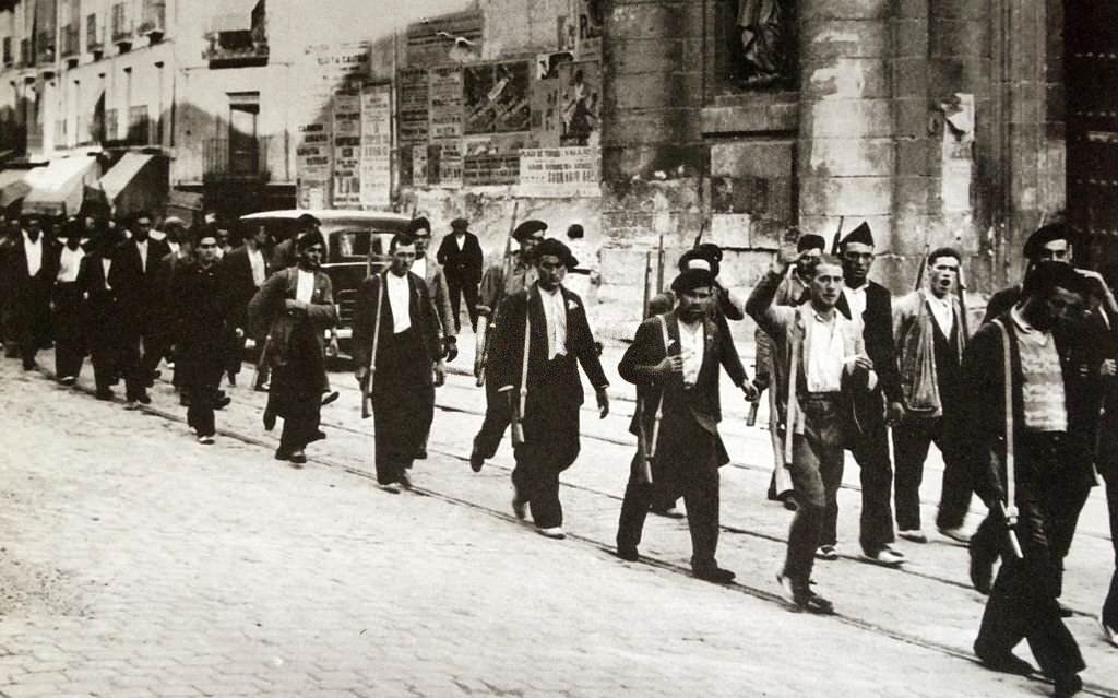 #53 Armed peasants in the Republican army march to Valladolid, during the Spanish Civil War 1936.