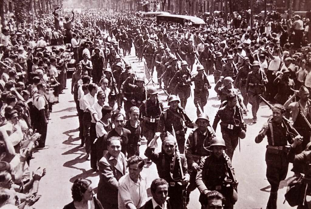 #54 Anti-fascist troops parade through Barcelona, during the Spanish civil war 1936.