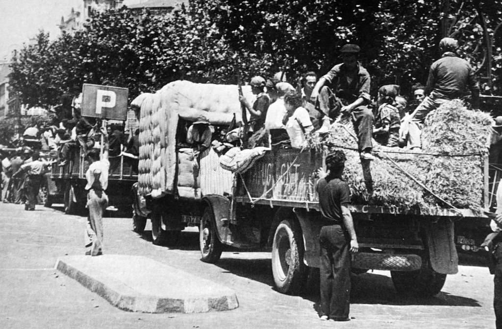 #55 Civil volunteers take up positions in central Barcelona in the summer of 1936 to defend the republic during the Spanish civil war.