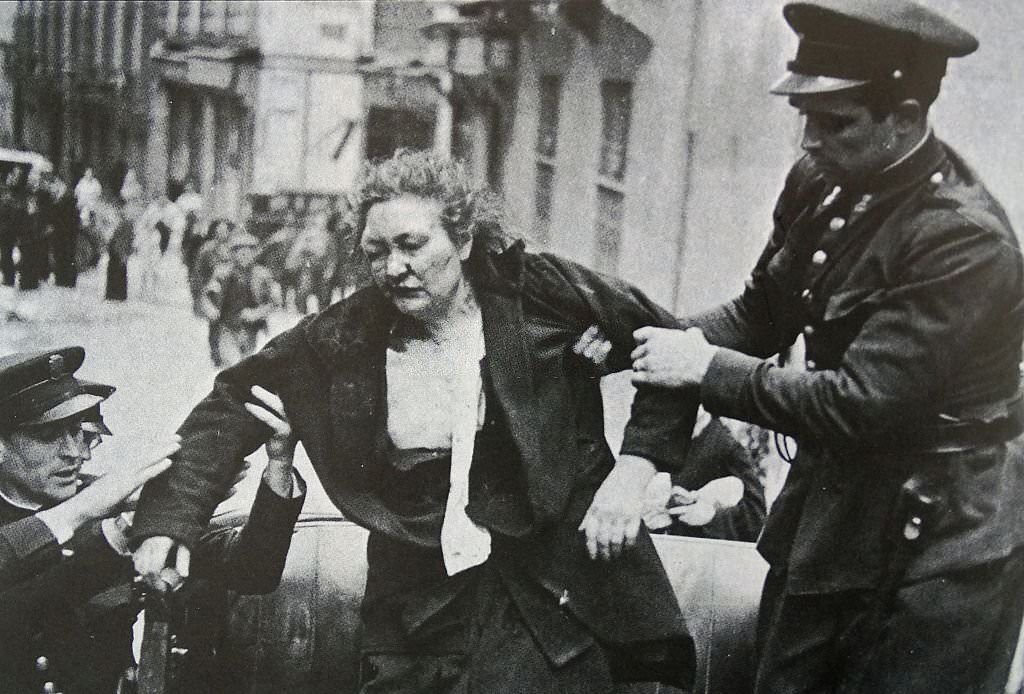 #60 Spanish woman helped by assault guards in Madrid.