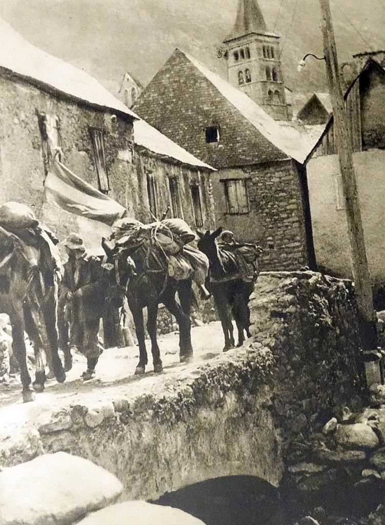 #61 Republican soldiers pass through a village in Spain, during the Spanish Civil War.