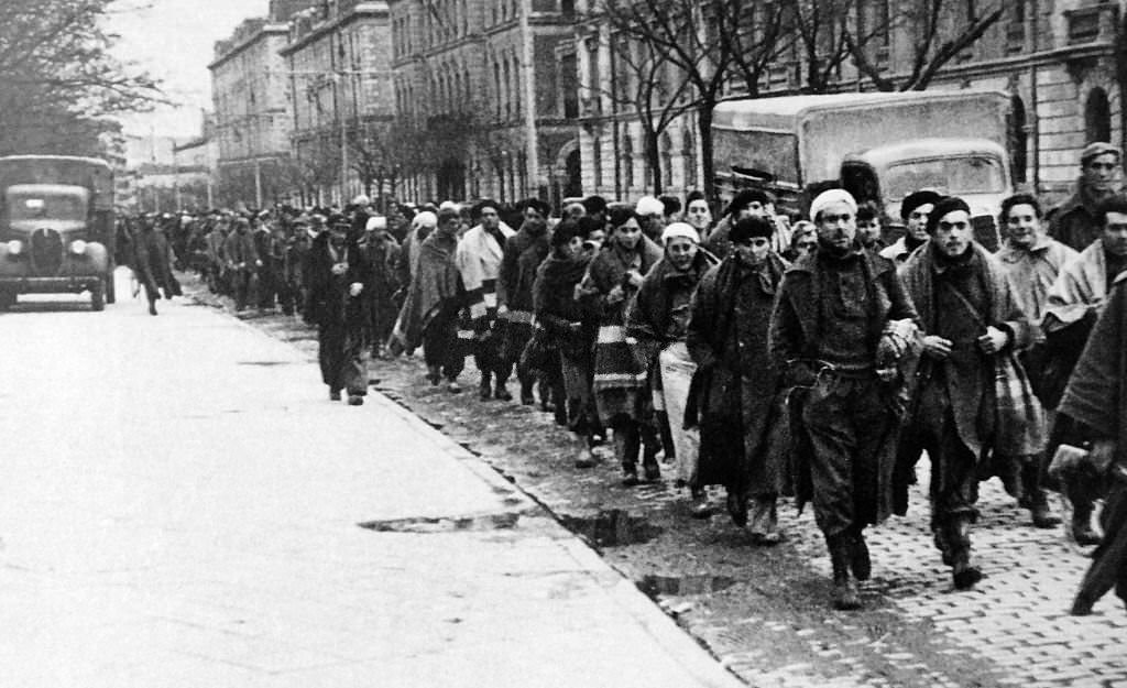 #63 Republican prisoners of war marched through a Madrid Street 1939, during the Spanish Civil War.