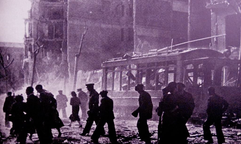 #64 Damage caused by a nationalist air raid on a Spanish city, during the Spanish Civil War.