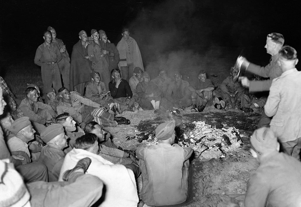 #72 German soldiers of Condor Legion with spanish allies celebrating their victory at a bonfire in Leon, 1939