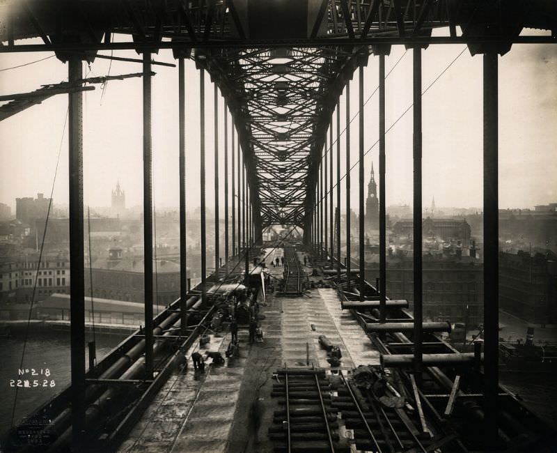 #18 View along the Tyne Bridge towards Newcastle, as work continues on its roadway, May 22, 1928