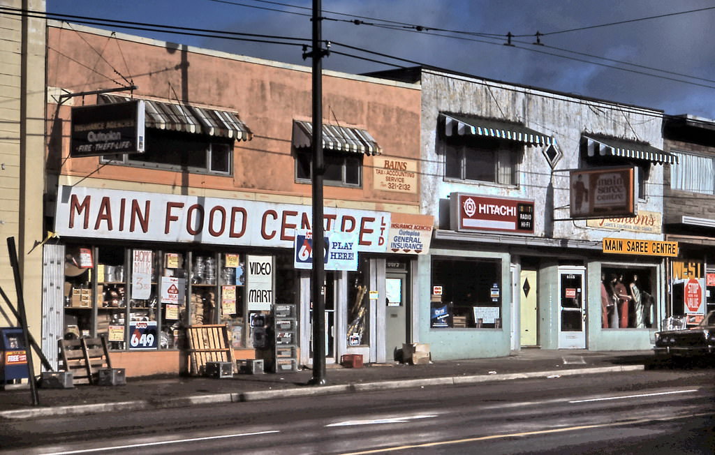 #143 Main Street Food Centre, Hitachi and Sarees, Vancouver, 1984.