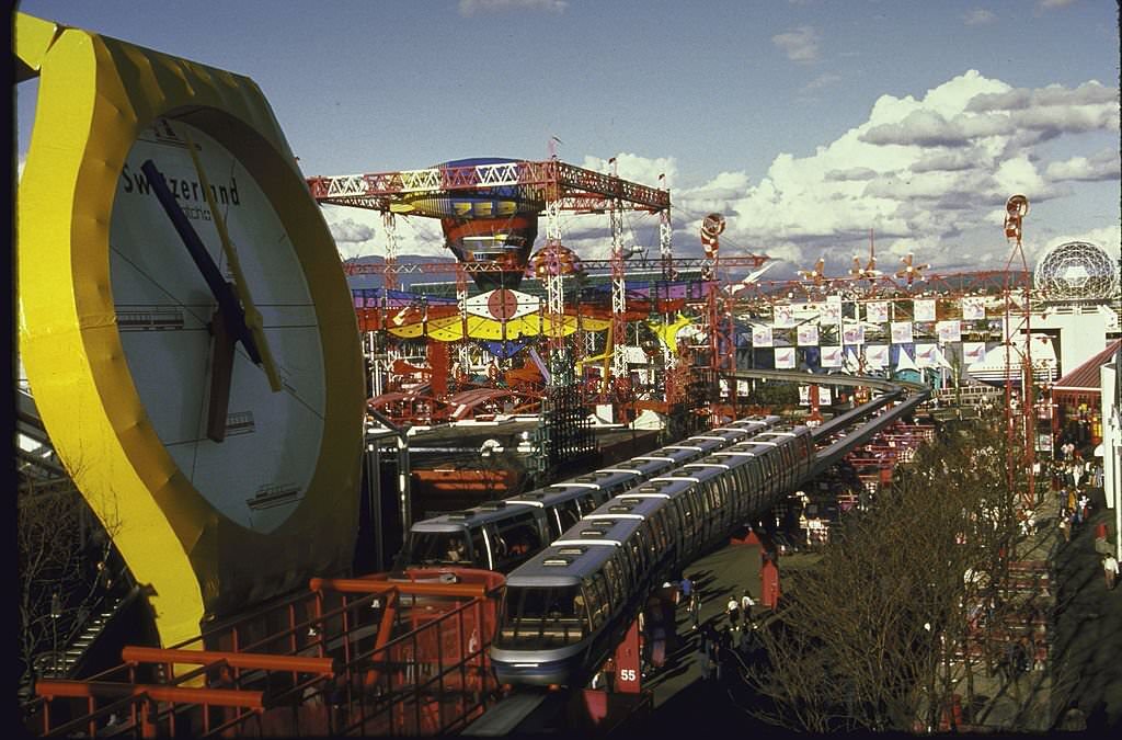 #177 Monorail swooping past Swiss exhibit at Expo 1986 World Fair.