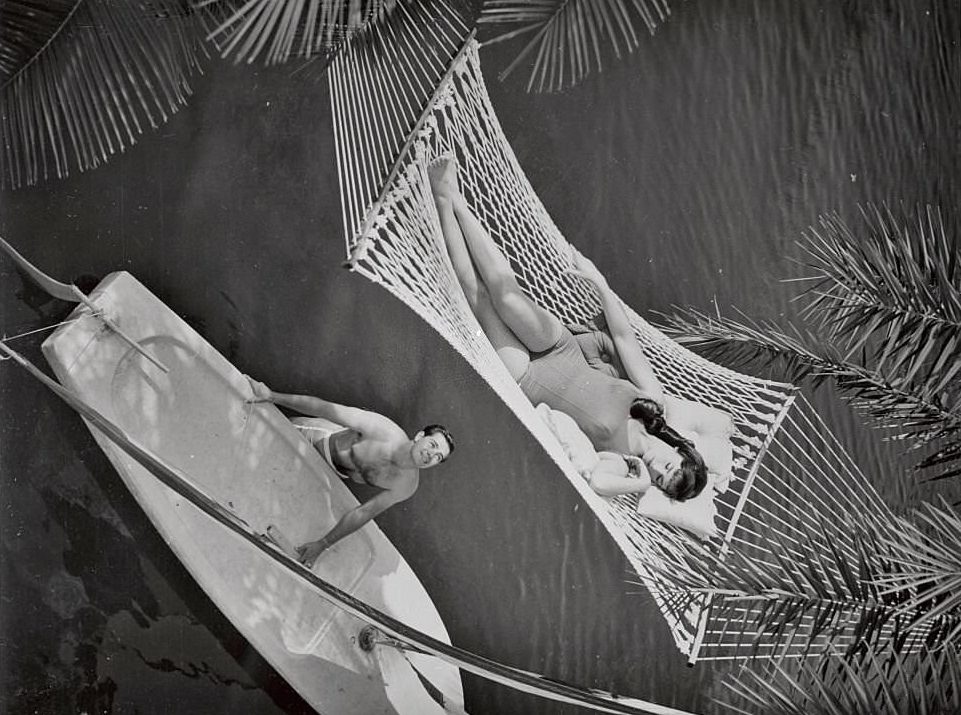 #102 Woman in Hammock Being Gazed Upon by Man with Sailboat at Cypress Gardens, Florida.