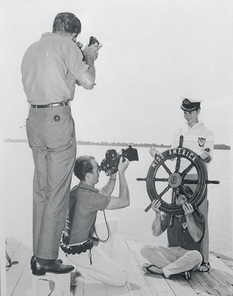 #131 Miss America of 1967 Posing at Helm