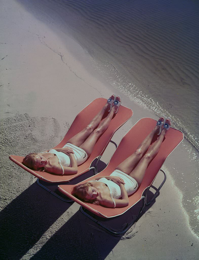 #13 Cypress Gardens Aquamaids sun on the beach at Clearwater, Florida, 1956