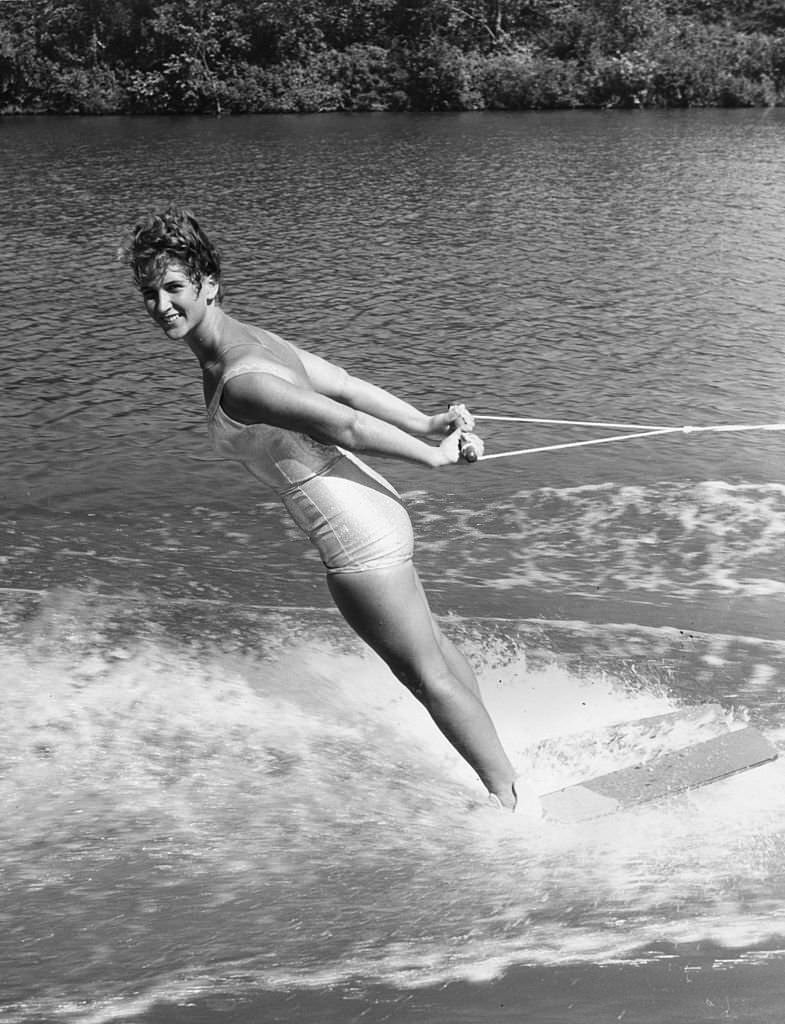 #164 A water-skier skiing backwards at Cypress Gardens, Florida, 1961