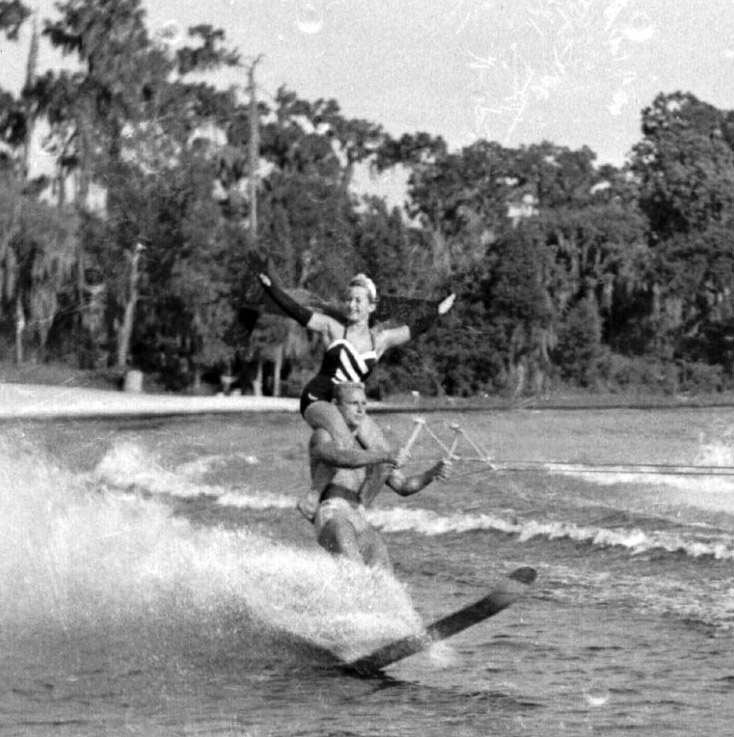 #187 Couple ski at Cypress Gardens, Florida, 1950s.
